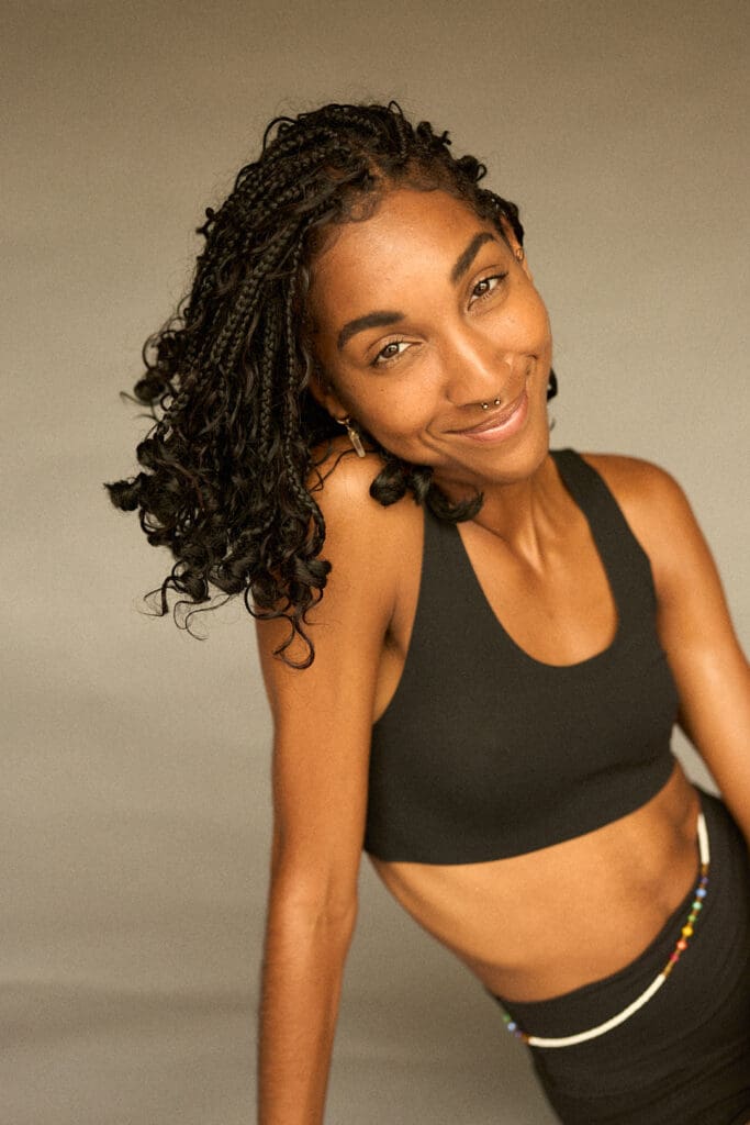 Kenieha Boren (Kenny Rae) is a certified yoga teacher, poet, and healing arts practitioner based in Nashville, TN. Her classes blend gentle movement, breathwork, and mindful stillness—inviting students to reconnect with their bodies, regulate the nervous system, and hold space for emotional release. Rooted in both creativity and somatic healing, Kenieha’s teaching offers a soft landing for anyone seeking presence, rest, and self-compassion.

Outside the studio, Kenieha is the creator of Write and Release, a community event combining restorative yoga, poetry, and sound healing, and the lead facilitator of Embodied Memories, a writing and mindfulness workshop series supported by Metro Arts. Through all of her offerings, she invites others to come home to themselves—through movement, story, and breath.